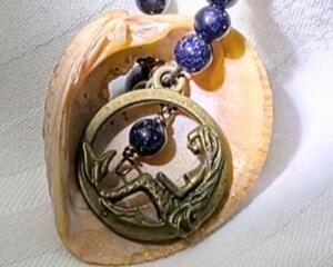 Brass Mermaid Shell Necklace with Blue Goldstone