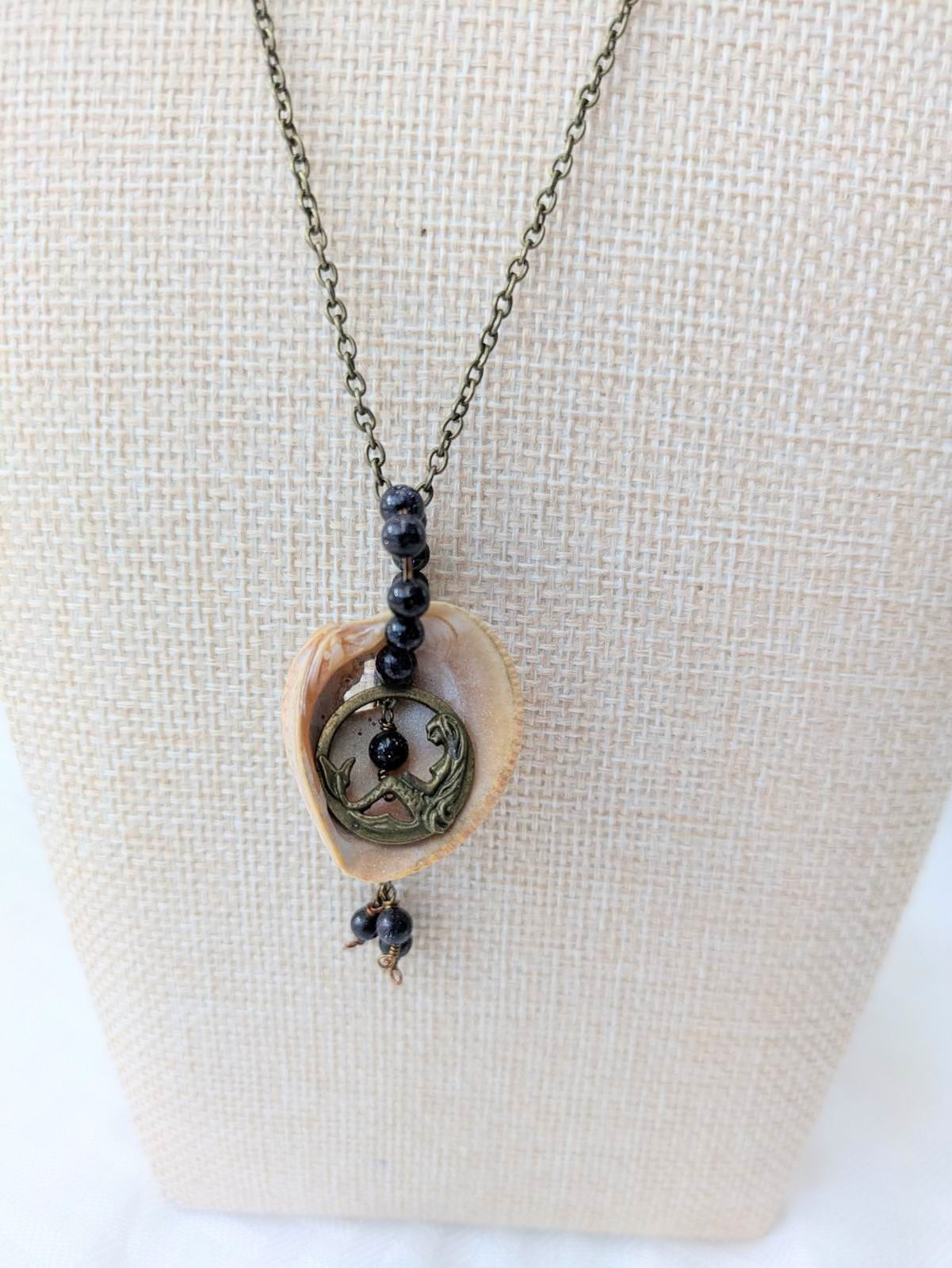 Brass Mermaid Shell Necklace with Blue Goldstone