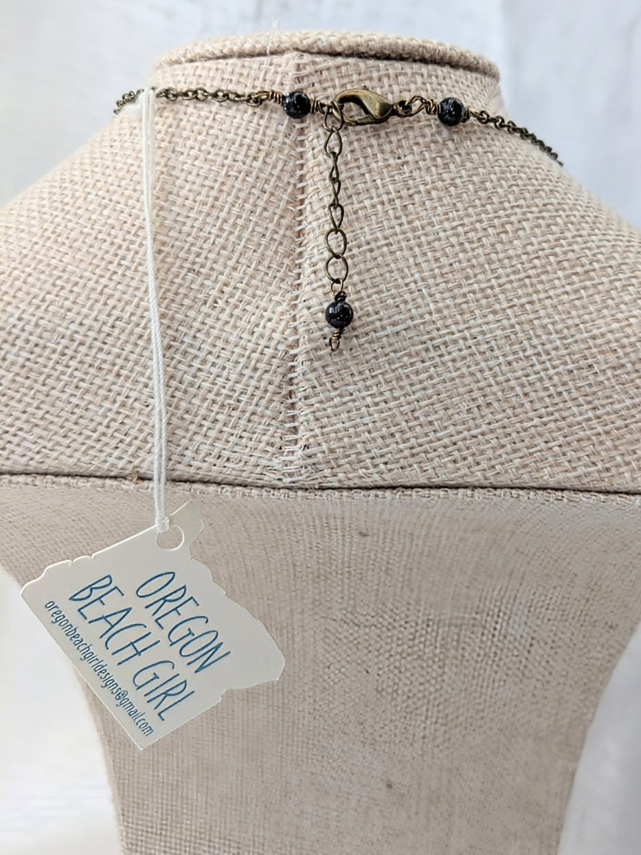 Brass Mermaid Shell Necklace with Blue Goldstone